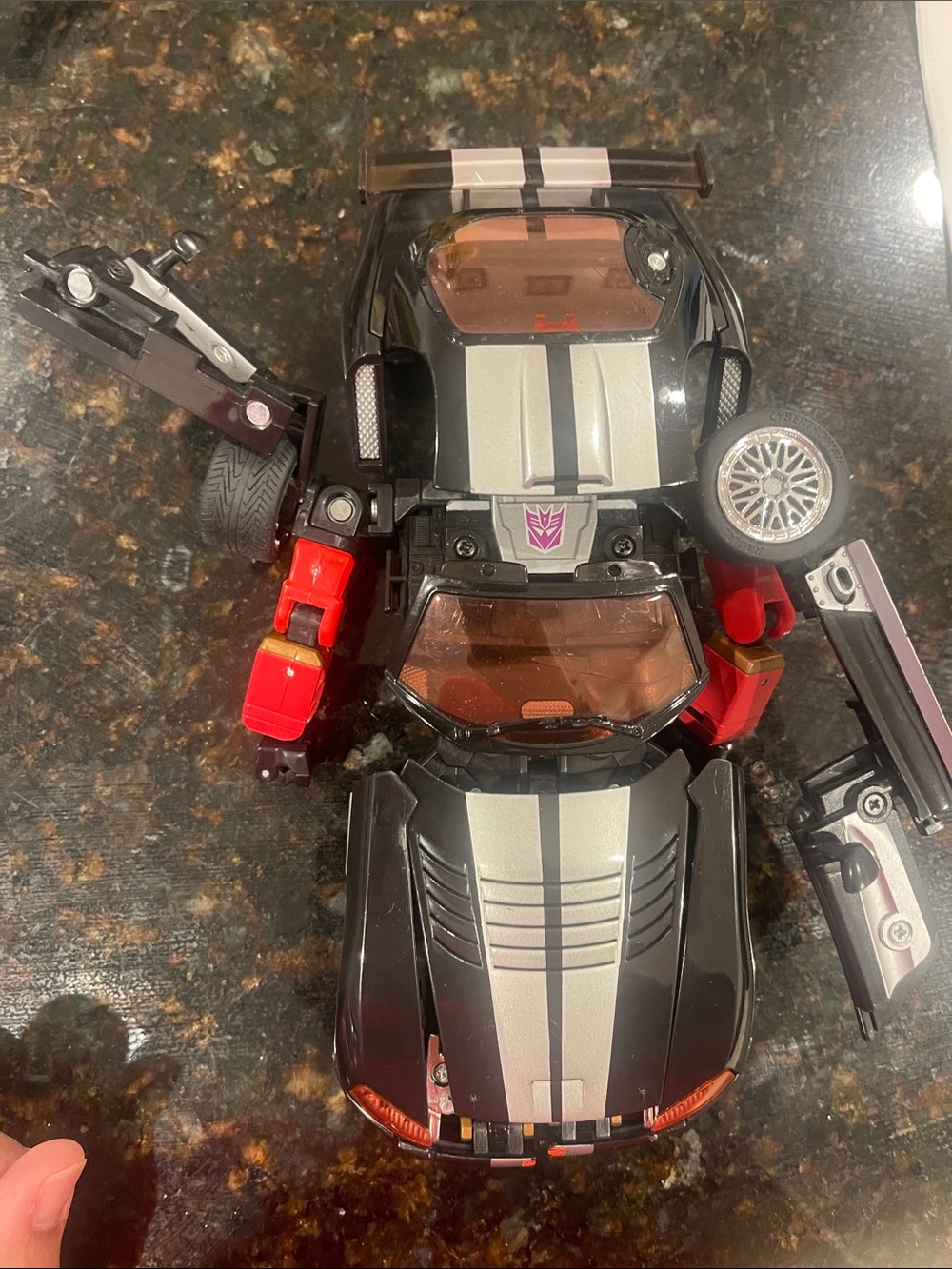 Mattel Black and Silver Transforming Car Robot Toy with Red Accents